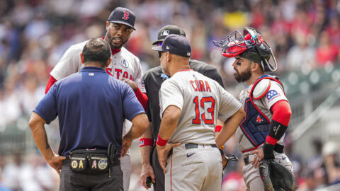 Boston Red Sox closer Aroldis Chapman and manager Alex Cora